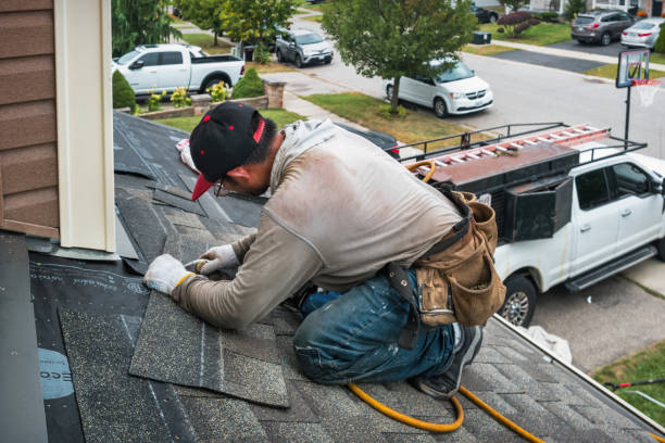 Professional Storm Damage Roof Repair technician working in Islip, NY